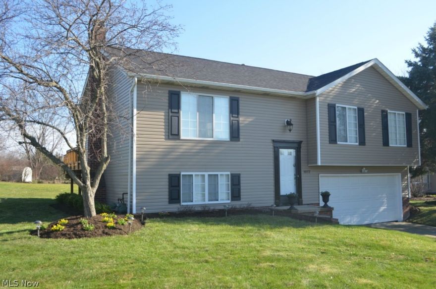 Welcome Home to a 3 Bedroom and 2 Full Bath with a park like yard in a quiet friendly neighborhood. Quality Updates Inside & Out! All the flooring on the first floor was updated in 2011. Lower bathroom and entryway from garage remodeled in 2012. Upper bathroom remodeled in 2013. New water heater in 2012. Deck updated in 2012 as well as a new slider from the dining room to deck. New roof and siding in 2012. New stainless steel appliances in the kitchen are just over a year old. Additional cabinets added to kitchen in 2013. Large family room with a wood burning fireplace. Excellent Nordonia Hills schools and easy access to major highways. Nice and bright and ready to move in! Neutral decor throughout makes the perfect canvas for your personal touches. A fantastic opportunity and truly a great place to call home!