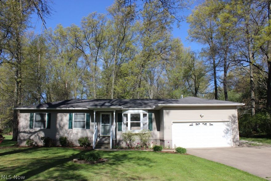 Lovely & spacious 3 bedroom, 2.5 bath ranch with 1612SF (main level) on .72 acre park like setting* Wood floors (living room, dining room, hall & 2 bedrooms)Updated oak kitchen with refrigerator, gas range, dish washer & microwave, pantry & appliance garage* Formal dining room* Family room with built in book shelves & cabinets* 30x10 3 season sun room off of family room* Updated bathrooms* Master suite with walk in closet & glamour bath with corner jetted tub, separate shower & ceramic floor* Office in lower level* Replacement Anderson windows* Furnace (2015)* Compressor for A/C (2015)* Humidifier & space guard filter* Reverse osmosis* Softener* Laundry chute* Attached heated 2 car garage with glass block windows* Private park like setting* Well inspection completed* WDI inspection completed*