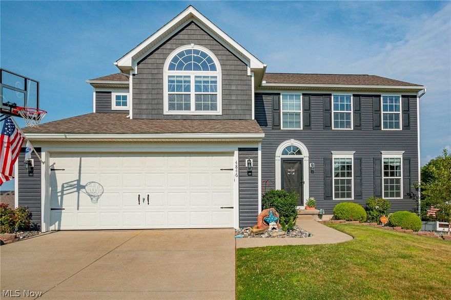The pride of ownership is evident here! Welcome to this beautifully maintained colonial situated on a corner lot in Green Local Schools! Upon entering the home, you are greeted by a beautiful two story foyer. The kitchen offers ample cabinet space and a large island. The many windows throughout the main floor and high ceilings in the great room allow for light to pour in giving it a bright and airy feel! Off of the garage is a nice sized mudroom including first floor laundry! A half bath and dining room complete the first floor. The master suite boasts a peaked ceiling, walk in closet and large en suite bath. Two other nice sized bedrooms and a full bath complete the second floor. The walkout basement offers a large rec room and an additional 4th bedroom or office that was recently drywalled in. Additionally, there is a half bath in the basement that is plumbed for a full. The large deck, which was updated in 2019, offers plenty of space for outdoor entertaining. Other updates include: