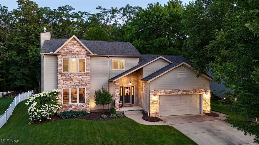 Welcome to 628 Ridgeline Drive – MOVE IN and ENJOY!  This home is well-maintained and cared for! As you enter, you’ll find a large foyer with a spacious coat closet, access to the upstairs, and a hallway leading to the half bath and kitchen. To the left, the generous living room/dining room area features a gas fireplace with a stone hearth and large windows that provide excellent natural light. The beautifully updated kitchen offers granite countertops, an under mount stainless steel sink, a ceramic subway tile backsplash, and stainless steel appliances—including a gas stove. The finishes, fixtures, paint colors, and flooring are all modern and neutral. The kitchen opens to the first-floor family room, which includes a sliding glass door leading to the deck and a nice, flat backyard. The entire first floor features newer laminate flooring. Upstairs, the primary bedroom is spacious and includes a gas fireplace. The en suite bath, updated in 2021, features a walk-in shower with white subway tile walls, a new vanity with granite countertops, marble flooring, a garden tub, and a walk-in closet. The additional bedrooms and the lower-level living space are finished with comfortable carpeting. Downstairs, you’ll find a finished 12-course basement with glass block windows and a large unfinished area that is already plumbed for a half bath—providing excellent potential for future expansion.  Call your REALTOR today!