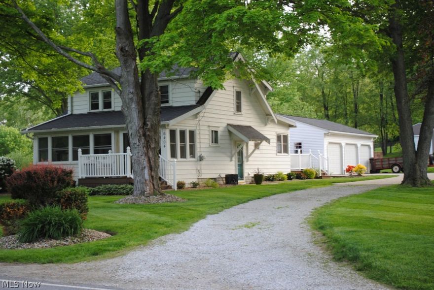 Charming 3 bedroom Colonial sitting on approx. 1 acre (.988).  Three car garage, spacious deck-well maintained yard.  Large storage shed.  Newly painted interior, remodeled eat-in kitchen, remodeled bath, 1st floor 1/2 bath, enclosed, finished front porch.  Very clean, well kept.  Replacement windows, five ceiling fans, newer hot water tank, furnace and C/A.  Glass block windows in basement and basement waterproofed.  Quiet, country setting.