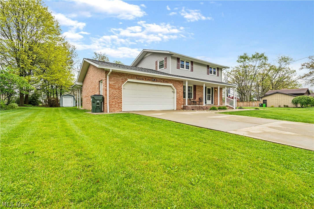 Wonderful 2-Story home on the Perry/Jackson border is all ready for its new owners. The living space is maximized in this very functional floor plan. On the 1st level, you will find a family room with laminate flooring and plenty of windows. From the family room, you can step onto your private deck with a hot tub. Opposite of the family room is the kitchen with Schrock pickled oak cabinets and a large dining room. The cabinets provide plenty of storage for the chef of the family. Tile flooring throughout the kitchen & dining room gives it a larger feel. The dining room is at the front of the house and has great views from the 3 large windows. An updated half bath on the 1st floor is ideal for guests. The 2nd level is home to all 3 bedrooms. If you are tired of fighting with the family over the bathroom space then you will love the fact there are 2 full baths on the second floor. Not only are there two but they are nicely updated. The owner's bath has double sinks, a laundry area, secon