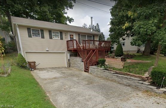 COULD BE 3 BEDROOMS. NOT in Flood Zone. This home is spacious now includes 2 bedroom, both with large closets and 1 bath plus a laundry on the 1st floor. The laundry could easily be 3rd bedroom or bonus room, you could move laundry to utility room in lower level. First floor also has large family room and eat in kitchen with all appliances staying. The basement has a family room/rec room, the carpet has been removed to install hard flooring, however not finished. 2 Car garage walk right into the lower lever. The front has a porch plus a patio with built in firepit. Great to sit out on those cozy nights. The association HOA is optional, giving you access to the beach and parking near the lake. check the association, Gloria Glens on line website.