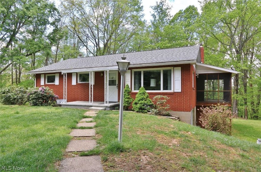 Nice brick ranch style home located in the Dillon Hills area.  This 3 bedroom, 1 1/2 bath home is located in Tri-Valley School district.  The wrap-around, covered deck offers a great space to relax while enjoying the backyard wooded view on approximately 1 acre.  Partially finished, walk-out basement . 1 car garage in the basement plus an additional 2 car detached garage.