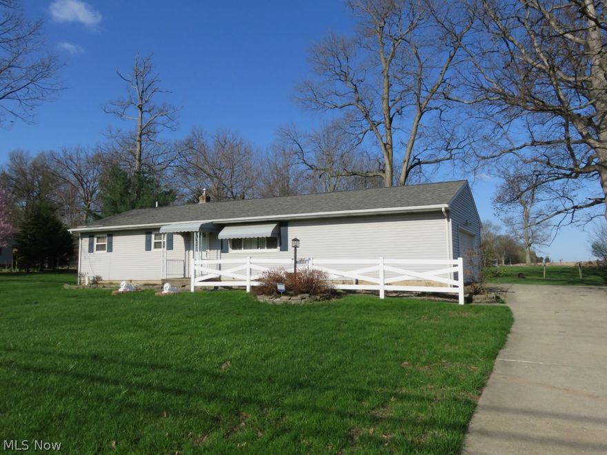Solid brick and vinyl ranch home with a friendly floor plan.  Many updates have been completed including newer roof shingles, new vinyl windows, updated electrical service, waterproofed basement, security system, newer furnace and central air conditioning, and updated bathrooms.  The living room is spacious and open to the eat-in kitchen with a view to the 2 tiered deck and open area back yard.  The kitchen has solid wood cabinets and cupboards, the abundantly sized master bedroom affords a private master bath and ample closet space.  The remaining bedrooms are of good proportion and function.  The basement provides a full bathroom and a recreation room with sundae bar - the recreation room carpeting was removed for accommodate installation of the waterproofing system. The deck overlooks a level backyard and additional open space.  The 2 car garage is oversized providing good storage space.
