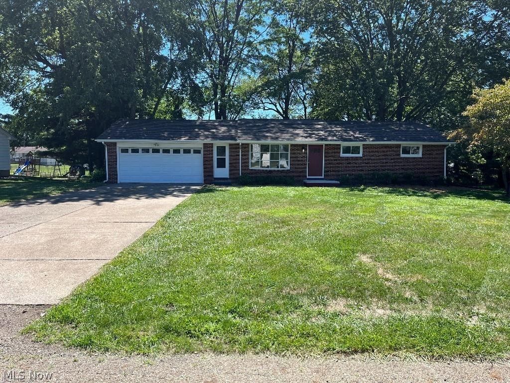 Beautiful three bedroom brick ranch in Perry Township. Private street and lot. Totally remodeled. New windows, furnace, A/C, new baths, carpet, flooring, fixtures, kitchen. Quartz countertops. Awesome lighting. Finished lower level with full bathroom. First floor laundry. Amazing! Ready to move in.