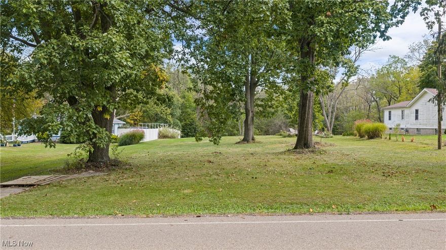 Can’t find the perfect home in Manchester Schools? Build your dream home on this beautiful 2.25-acre lot located on Hampsher Road off West Nimisila in New Franklin. The property offers 93 feet of frontage and stretches over 1,000 feet deep, with a small creek at the rear for added natural beauty. A prior home once stood on the site but was professionally demolished in 2020 after storm damage. The septic system was professionally abandoned with county permits. A site evaluation from 2005 is available in supplements. Site evaluation in supplements. Summit County approved for a three bedroom home. Don’t miss this opportunity to create your own private retreat in a desirable location!