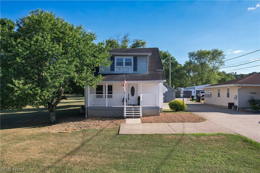 Welcome to this beautifully renovated 1.5 story home, where classic 19402 charm meets modern convenience. This home has been meticulously updated from studs in, featuring new electrical systems, new flooring throughout, and wood flooring preserved under luxury vinyl tile. The entire home has new drywall and insulation, ensuring comfort and energy efficiency. The inviting southern front porch, accompanied by a lovely cherry tree to the side, offers the perfect spot to relax and enjoy the neighborhood. Additional outdoor spaces include a small back porch with picturesque magnolia tree. The property includes a detached garage and an unshared driveway, providing ample parking. The lot has been newly surveyed with stakes marking the boundaries. Inside, you'll find first floor living convenience, while an unfinished basement with a cellar under the porch area offers endless possibilities and future expansion. Located in the heart of South Parkersburg, this home combines modern updates with the timeless appeal of the 1940s. Don't miss your chance to own this charming centrally located gem.