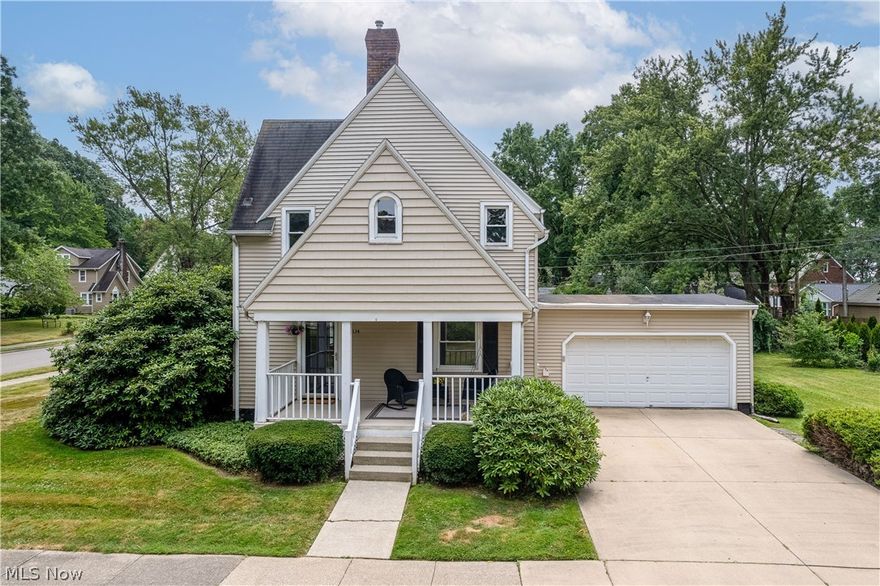 Nestled in a mature, charming neighborhood just a block from Durling Park, this adorable two-story home exudes timeless appeal. A quintessential covered front porch, complete with a porch swing and ceiling fan, invites you to relax and enjoy the surroundings. Step inside to discover the character and charm of arched doorways, glass doorknobs and wood flooring that flows throughout most of the house. The living room features a cozy fireplace, flanked by decorative inset shelving and a wood mantle, creating a perfect focal point. Abundant natural light fills every room. The first floor includes a convenient half bath and an eat-in kitchen boasting classic black and white checkered floors, along with a stainless steel dishwasher and range. Upstairs, you'll find natural wood floors in all three bedrooms. The primary bedroom offers a walk-in closet, and the bathroom features a tiled surround in the tub/shower. This home is a true gem in a sought-after location!