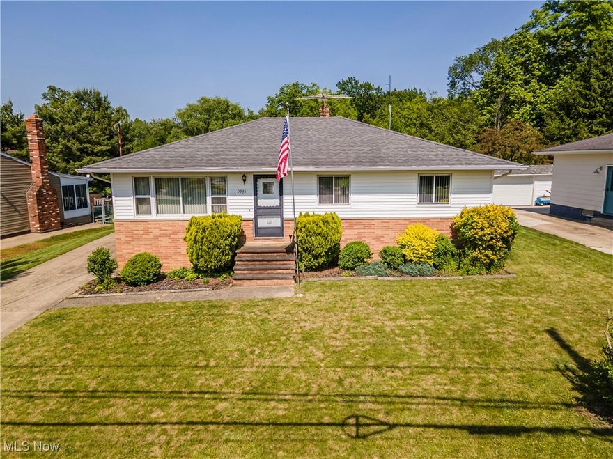 Welcome to Ranch style living in a Three-bedroom charmer in the heart of Northfield Village that has been owner occupied by the same person since 1976! This quaint home offers one floor living with original hardwood flooring through out!  The spacious living/dining room is bright and airy and is adjacent to an eat in kitchen with maple wood cabinets and lots of storage. All bedrooms offer spacious closets, and the main bedroom features a half bathroom with newer sink and toilet for your convenience.  A full bathroom with newer tile, shower and toilet finish off the main floor.  The full basement has loads of potential for a rec room, work out room or office set up! The back deck/steps was recently built and the property sits on .3 of an acre with a two plus car garage, outdoor storage, garden beds and is surrounded by 13 acres of preserved woods behind the house!  Roof, siding and gutters approximately 10-12 years old.  Schedule your tour today!