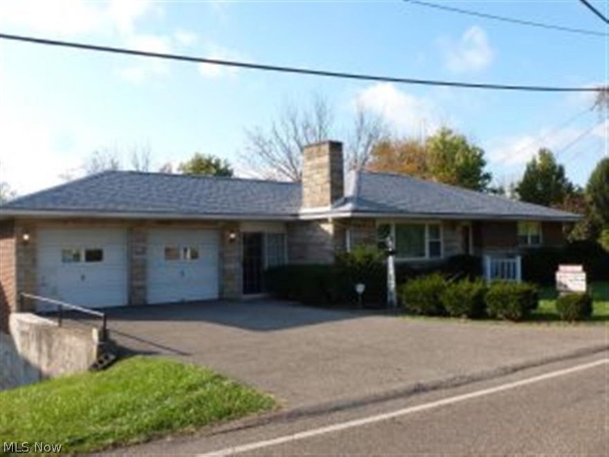 Ranch home with 2 bedrooms and 2 baths.  Big Living Room with Fireplace. Dining Room could be converted into bedroom 3.  Lots of closet space through out the whole house.  Huge Rec Room with bar and Kitchen in the basement along with a full bath.  Nice two car garage. Wheelchair accessible to the basement.