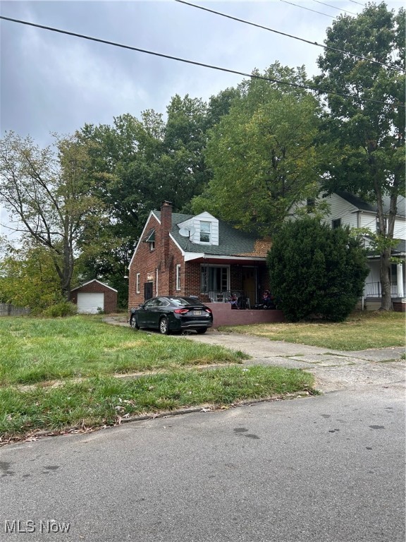 This brick/ frame cape offers eat in kitchen, 2 bedrooms, living room and full bath on first floor with additional third bedroom on 2nd floor. Home has unfinished basement and detached brick/ frame garage. The property is sold in as is condition.”