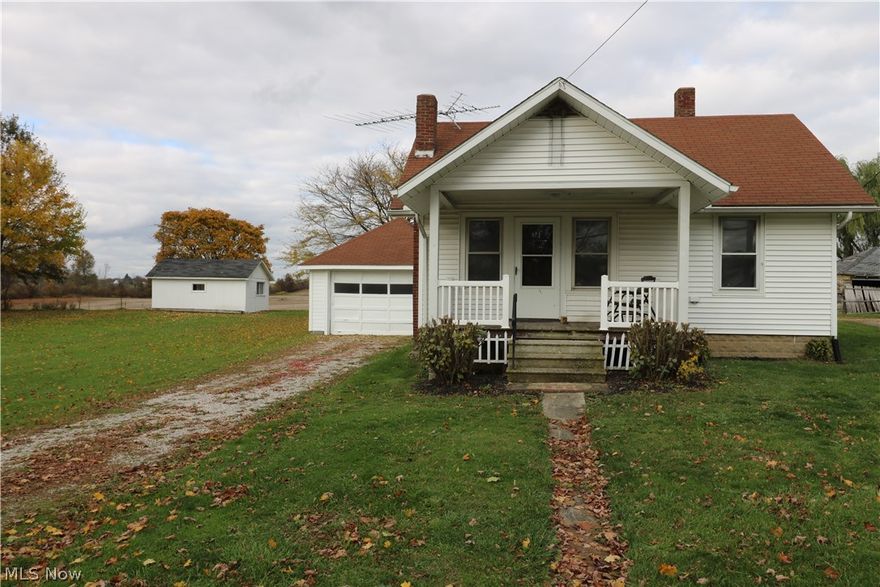 Ranch 3 bedroom home with lots of potential! Improvements include vinyl siding, electrical service with new 100 amp breaker and wiring. Covered porch, large yard, country views! Detached garage and garden shed freshly painted.