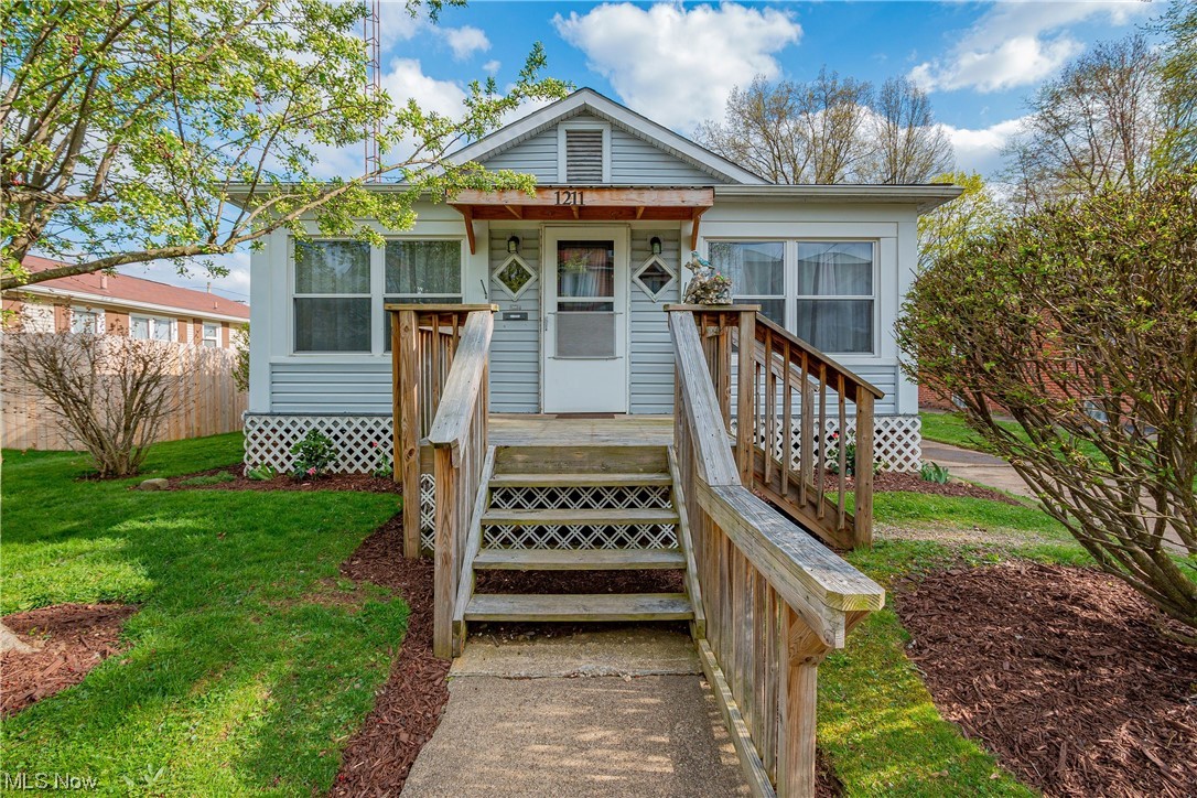 Spring right into this adorable ranch featuring two awesome porches, first floor laundry and a fenced in yard!! The large enclosed front porch you enter through gives you the perfect space for shoe and coat storage. You could also use it as a craft room, office, or just a bonus room to enjoy a cup of coffee! The living room is so cozy and inviting, boasting built in shelving and a nice large open view to the dining room. One of the three bedrooms has been converted to a first floor laundry room. The laundry could easily be moved back to the basement! Speaking of the basement, the previous owner had it waterproofed so it makes a great, safe place for ample storage or a potential rec room! One of the sellers favorite features is the backyard. The wooden privacy fence is complimented by the huge covered porch which makes the perfect private oasis for everyone to enjoy themselves! Some of the key updates in the last seven years includ misc paint, vinyl flooring, breaker box, range, roof, f