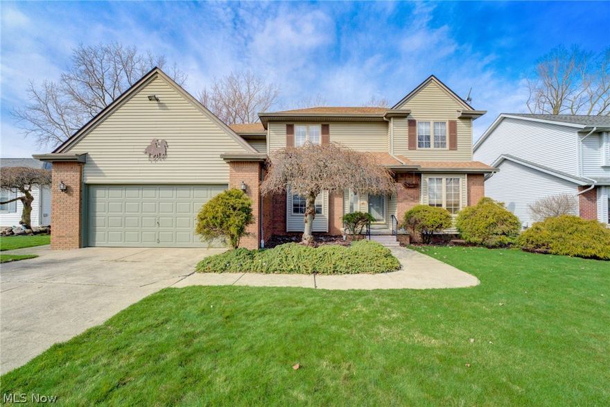 Welcome to this beautiful 4 bedroom 2.5 bath colonial located in sought after College Green Development. With over 2800 square feet of living space, this home is sure to provide the space for everything you need! As you enter the foyer you are greeted to the left with a formal dining room with tray recessed ceilings, and to the right a den or study, perfect for a home office or play room. Continuing past the split staircase is an incredible family room with 2 windows providing lots of natural lighting, wood burning fireplace, and a wet bar with built in wine rack. The family room is open to a large 19x18 eat in kitchen with built in island/breakfast bar and desk. Kitchen has slider that leads out to an incredible fully fenced backyard with patio and two tiered deck, partially covered by a canopy. The possibilities for this yard are endless and this is one of the larger lots in the development at one third an acre. Rounding out the first floor is a laundry room and half bath that was updated in 2020. Upstairs you will find 4 nice sized bedrooms and two full baths. Master suite is 18x13 and has an ensuite master bath with walk in closet, double vanity and jacuzzi tub. The master bedroom has an additional huge walk in closet and door leading to an additional 400+ square feet of storage above the garage. Finished recreation room provides 450 sq ft of living space and features an additional fireplace.
Two car garage, with new garage door opener in 2023, extra deep area has a closet with a 2 year old garage refrigerator. Cold water in garage, and front and back yards. Many extras, heated gutters with gutter guards, sump pump with battery back up. Kitchen Fridge new 2023, dishwasher 2 years old, stove 3 years old, roof approximately 5 years old. Terrific location, right around the corner from Lorain Community College and plenty of shopping and restaurants! This home is a must see. Please your favorite realtor, this home will not last!