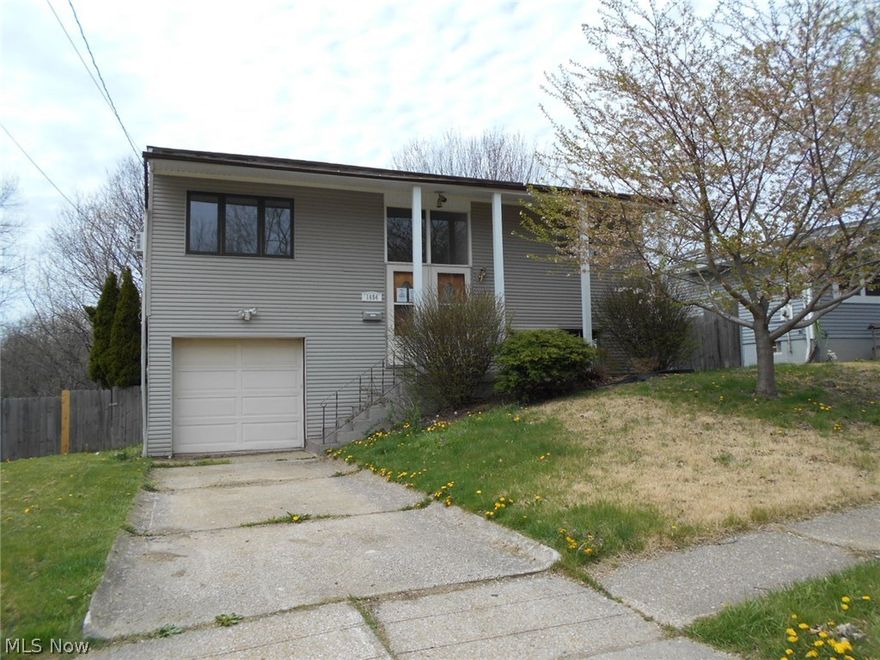 Four bedroom, two full bath bi-level with some updates completed.  Wood floors and vaulted ceilings in living room and dining area. Ceramic floors and vaulted ceiling in galley kitchen.  Upper bath has been updated in the past with ceramic, tub and surround, and pedestal sink. Each bedroom has a large closet with bi-fold doors and plenty of windows.  Great entryway with large windows provide plenty of light.  One car attached garage has work space and entry door into fully fenced rear yard. Large deck off back of house provides plenty of room for cooking out, entertaining, and relaxing. Close to shopping, public transportation and entertainment. See attachment for PAS requirements and WFHM offer submittal information in MLS document section.