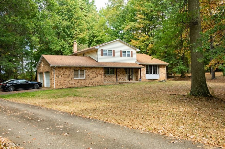 What a beautiful place to call home! This extra Large 4 Bedroom 3 Full Bathroom Split-Level is so different than others! There is 1 Bedroom and 1 Full bath on the main floor! Extra Large kitchen with all new stainless-steel appliances! The other 3 Bedrooms and 2 Full Baths are on the 2nd level. There is a 1st Floor Laundry right off of the kitchen for convenience. There is a lower-level AS WELL AS AN ADDITIONAL 12 COURSE BASEMENT! Lots and Lots of natural lighting and spacious rooms. Living Room as well as Family room with fireplace. Over sized 2 car Garage! The OVER 1 ACRE WOODED LOT IS ABSOLUTELY BREATHTAKING! Lovely over-sized front porch as well as back patio. Well and Septic