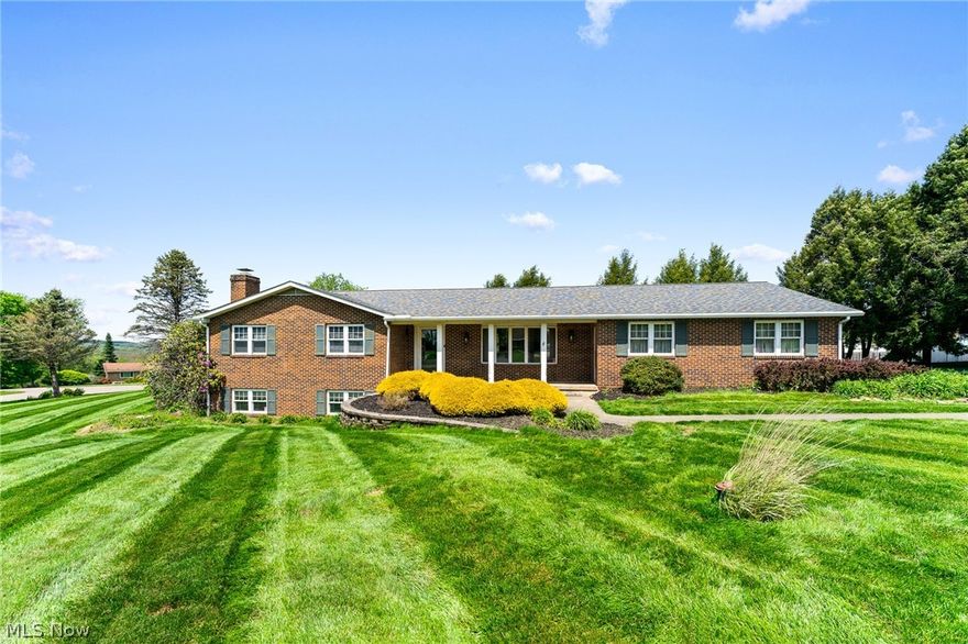 Welcome home to this beautifully maintained brick ranch nestled in one of the area’s desirable neighborhoods Fredrick Heights in Beaver Local Schools.
Offering 4 bedrooms and 2.5 baths, this home sits on over half an acre and combines timeless charm with thoughtful updates. A cute covered front patio creates the perfect first impression, while the concrete drive and attached two-car garage add everyday convenience. Inside, you’ll find laminate flooring flowing seamlessly throughout, along with an updated kitchen and renovated bathrooms that bring both style and function. The finished lower level expands your living space with a spacious family room, an additional bedroom, and a bath, ideal for guests, a home office, or multi-generational living. The basement has plenty of room for storage with a full walk-out basement as well. Out back, enjoy a nice deck overlooking the generous yard, perfect for relaxing or entertaining. This home truly offers the space, updates, and setting today’s buyers are looking for.