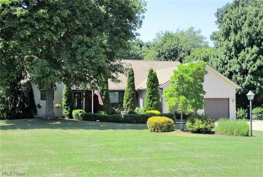 Gorgeous 4-bedroom, 3-bath ranch home with vaulted great room with gas fireplace, dining area and open kitchen.  Kitchen features breakfast bar, table area, center island, gas range and Jenn-air grill.  Kitchen appliances all stay plus front loading washer and dryer.   Private living room off the master suite features office area and gas fireplace.  Master has double walk-in closets, whirlpool tub, shower and double sinks.  2-large bedrooms on the opposite side of the house, one features a walk-in closet. Home has hardwood flooring on most of the main level.    On the lower level that walks out to the back yard, there is a huge family room, 4th bedroom (currently used as a sewing room) and full bath with shower.  An additional area that could be finished, a utility storage area and lots of closets.  2-car attached garage with hot/cold water, concrete driveway with extra parking for cars or recreation.  Front porch with landscaping fountain.  Step out back to a 2nd story deck, above ground pool with a new liner 2015, brick patio and invisible dog fenced back yard.  Per utility companies 9/2/2016 Electric: $93 per month average Gas: $68 per month average. Septic inspection done 11/1/2016 by Ashtabula County Health Dept. Passed. This is a very unique home and a must see in person.