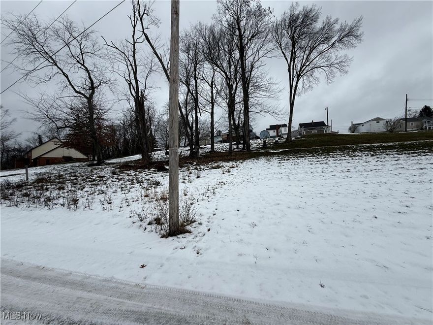 Cleared Lot in Prime Buena Vista Subdivision. This beautiful cleared lot in the Buena Vista Subdivision offers convenience and opportunity. With water and sewer connections nearby, it?s ready for your next project. Enjoy close access to a variety of businesses and quick connections to State Route 22. Located just 10 minutes from Weirton and approximately 25 minutes from Robinson Township in Pittsburgh, this lot combines a peaceful suburban setting with unbeatable convenience. Buyers are encouraged to perform due diligence regarding any building restrictions.