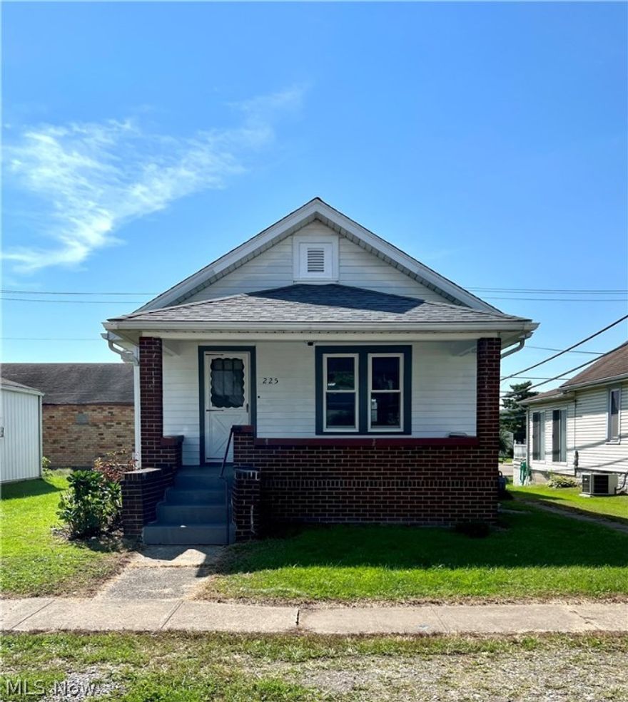 Remodeled and updated 2 bedroom ranch home with a detached 1 car garage. New furnace, AC, water heater, roof, flooring, bathroom, lighting and paint.  Refrigerator and stove included. Agent Owned