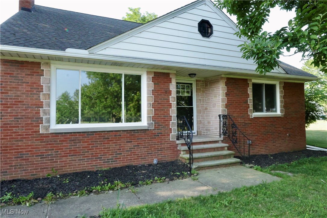 Find your perfect fit at this fully updated west side bungalow. Everything has been updated in this mid-century beauty with unique architectural features inside and out. Hosting friends and family is made easy by the flow from the kitchen out to the large backyard deck, or through the dining area into the large living room with the cozy fireplace. The basement is large enough to maintain plenty of storage while finishing off a portion for additional recreation space. Oh..and where else can you find nearly an acre in the city for your homestead garden? The location makes for quick access to Mercy Hospital, Lakeview Beach, downtowns Lorain and Vermilion, and a number of community parks, and it's a 38 minute drive down scenic Route 6 to the Cedar Point parking lot. Book your showing today!!