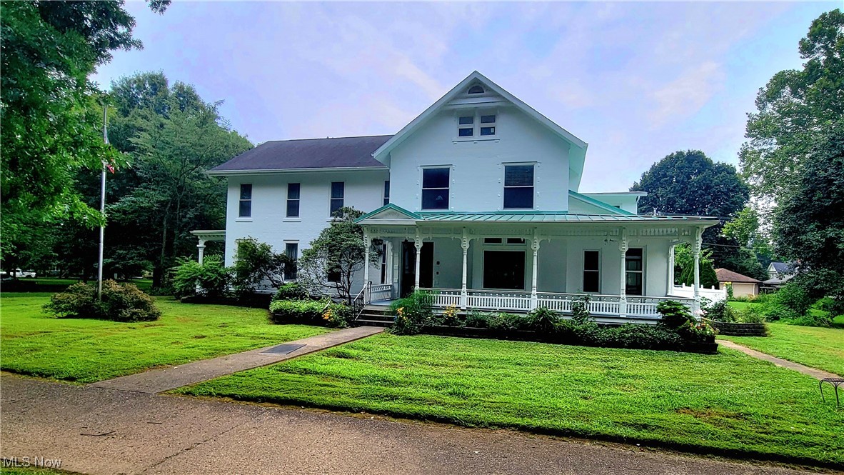This lovely historic home has much to boast about: spacious primary suite on the 2nd floor, along with 2 other bedrooms, first floor bedroom & bath, parlor, gigantic family room, complete with fireplace & pizza oven, gourmet kitchen, walk in pantry, carriage house, geothermal heating system, office area, large patio, plenty of parking - the list goes on & on. Make your appointment today & see for yourself. Being sold "As Is".
Approved buyers only, please.