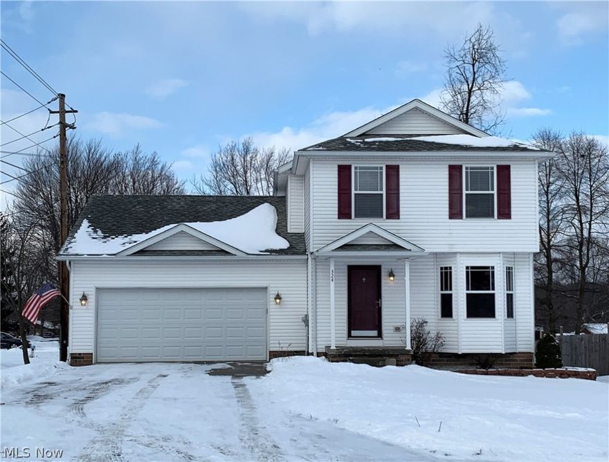 Super cute and clean 3 bedroom colonial right across the street from the park! A covered front porch, bay window, paver surround on the flower beds and classic colors make for an attractive exterior. Inside, wood-look laminate flooring give a clean look to the bright living room! The eat-in kitchen will be left fully applianced for your convenience and boasts gorgeous tile backsplash and neutral tile flooring that span through the 1/2 bath and 1st floor laundry room! The lower level is currently under construction to be finished (approx. 500 sqft) with drywall, ceiling and carpet (hurry to be able to choose your own carpet & paint colors!). An entry door from the laundry room leads to the backyard with concrete patio. The 2nd floor offers a full bath with access to the master bedroom along with 2 guest bedrooms. This turn-key home is ready for you to fill with memories!