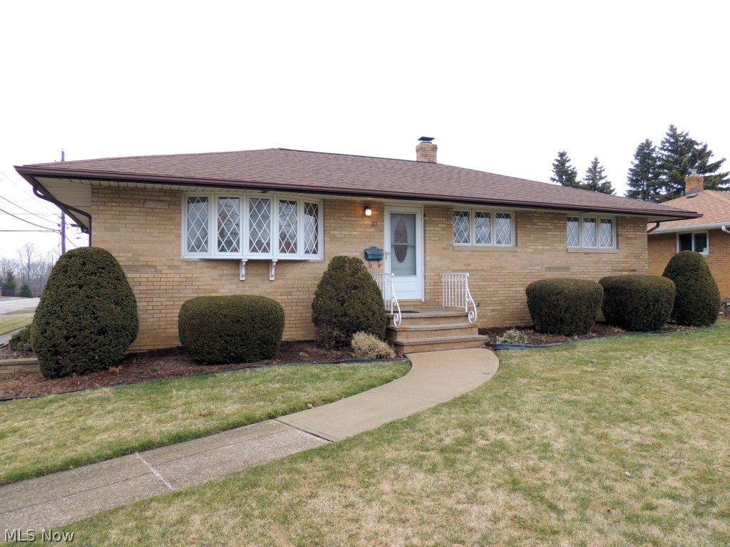 Seven Hills Brick Beauty Offers A Unique Floor Plan With 3 Bedrooms, 2-1/2 Baths and Huge Basement! Main Floor Features Wood Floors Throughout, Formal Living Room, Dining Room Plus Additional Family Room Open To Kitchen. Dining Room With Built In Cabinets. Newer Pella Windows, Glass Block, Roof & Electric Panel. 2 Car Garage & Huge Patio! Superb Value For All The Space, Call To See Today!!