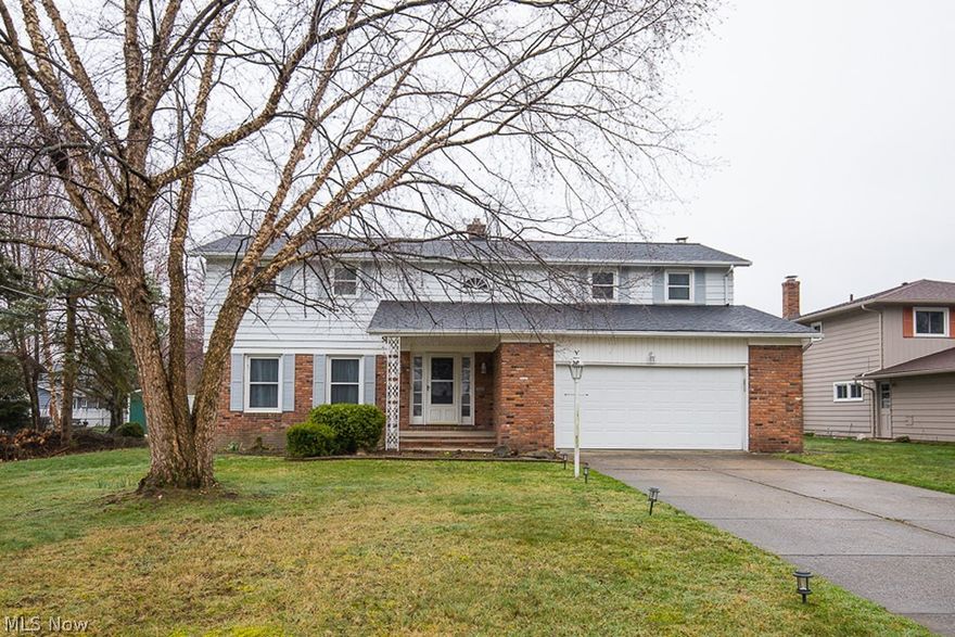 Step into this extraordinary open-concept kitchen, sure to captivate all who enter this charming 4-bedroom, 2.5-bathroom oversized 2 car garage in the sought-after Seven Hills community with a brand NEW Roof! The main level welcomes you with a two-story entrance, flooding the living room with natural light from its elegant tray ceiling. The living room seamlessly connects to the stunning chefs kitchen, adorned with quartz countertops and stainless steel appliances. A grand staircase leads to an expansive master bedroom suite with an attached full bathroom. Three more generously sized bedrooms and an additional remodeled full bathroom complete the second floor. For extra recreational space, you'll discover a finished basement, adding versatility and room for leisure. Nestled on a generous 1/3 acre lot, this home offers an abundance of space and privacy. The entire property is fully fenced in, providing security and seclusion for you and your loved ones. This home is perfectly situated near an array of fantastic amenities, including shopping, restaurants, and a short drive to downtown Cleveland.