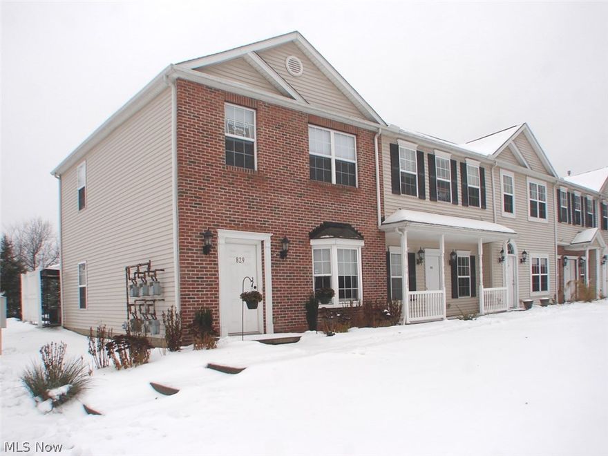 Maintenance free Living just minutes From KSU, NEOMED, UH Portage Medical Center, and I76.  Beautiful, Young - built in 2005, Brick Veneered End-unit Condo with 1344 Square Feet COMPLETELY updated to like Brand_NEW!  Gorgeous, Hard-wood laminate floors throughout with Ceramic Bathroom Floors -- 2 Full Baths and 1 Half Bath complement the 3 Bedrooms.  Master Bedroom has its own Master Bath and Walk-in Closet.  Updates Galore -- Tastefully Done with Contemporary Flair Throughout the entire Condo -- Truly Gorgeous and Impressive!  9 Foot Ceilings - Crown Molding - Cordless Cellular Shades - Custom Window Treatments - WOW and a Designer Kitchen with Premium Stainless Whirlpool Appliances that will stay with the purchase, Koehler Cast Iron Sink, Delta Designer Faucet, Filtered Water Dispenser, Contemporary Glass-Tile Back-Splash, LED Under-cabinet Lighting - NICE!  Relax in the Spacious & comfortable Family Room wired for Surround Sound and Internet on two sides.  Convenient attached Garage