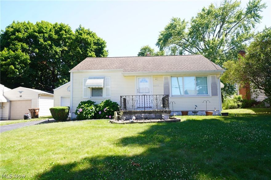 Come see this cute ranch with 2 bedrooms, eat in kitchen, living room and full basement.  As you drive by you will notice the newer vinyl siding and roof with an attached 1 car garage.  Hardwood floors throughout with plaster walls and title in windows are definitely nice features There is a washer and dryer hooked up in one of the bedrooms on the first-floor bur you can move back in the basement if that works out better for you.  Basement features a shower as well as additional room to spread out.  Also, newer a/c, and features ceiling fans as well.  Call and see all this for yourself.