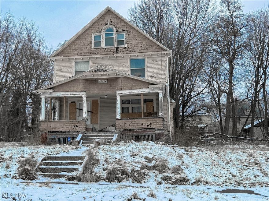Get it before it’s gone—literally. This property is currently on the City of Youngstown’s demolition list and offers an opportunity for a bold buyer ready to take on a true renovation challenge.  Are you up for the challenge? This 2 story home has a full basement and a walk up attic. Buyer is responsible for removing all contents AND responsible for verifying demolition status with the City of Youngstown. Property is being sold to settle an estate. Seller has no knowledge of the home and makes no representations. It is being sold AS-IS with no utilities on site. Bring a flashlight for showings.