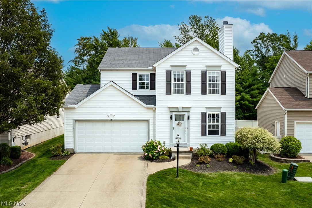 Nothing to do but move-in to this gorgeous 3 Bdrm, 2.5 Bath Colonial in Greenbriar Colony! Full basement, first floor laundry and attached 2 car garage. Enjoy a modern, updated home with a gorgeous newer kitchen and tons of natural light! Large center island, soft close cabinetry, granite counters, tile back splash, stainless appliances which all stay (including gas stove), stainless farmhouse style sink and eat-in area! The spacious family room has a beautiful fireplace and surround. Additional updates include: Front storm door (2023), Hot Water Tank (2022), New sump pump w/back up battery (2021), Heating & cooling (2015), newer engineered flooring throughout main floor, newer bathrooms, newer ceiling fans, blinds, carpet, light fixtures, hardware, and much more! Nice backyard has a large stamped concrete patio (2014) and could easily be completely fenced in! Come take a look! Greenbriar Colony has a nice playground and walking trail that residents love!