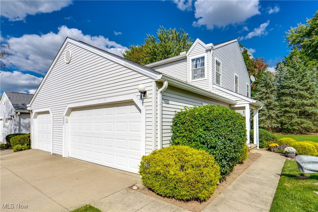 Welcome Home! This beautifully updated end-unit townhome in Northfield has been thoughtfully renovated from top to bottom and is move-in ready. Step inside to find fresh paint, newer flooring throughout, a fully updated kitchen with granite countertops, tile backsplash, and high-end stainless steel appliances—including a safe and efficient induction cooktop. The first floor features a convenient layout, complete with a kitchen counter that accommodates barstool seating, a dining area, a spacious living room, and a half bath. Sliding doors open to your private patio, perfect for enjoying crisp fall evenings. Upstairs, you'll find two large bedrooms with closet space and a shared full bath. The lower level adds exceptional flexibility with a large rec room that can be used as a potential guest or entertainment suite, complete with another full bathroom. You'll also appreciate the new furnace in 2023, updated electrical panel, 2021 hot water tank, and ample storage. Additional highlights include a two-car garage attached. The semi-private backyard offers backyard space, giving you room to relax and enjoy. Living here also means peace of mind with the HOA covering roof replacement, which was just completed a few years ago, landscaping, snow removal, and most exterior maintenance. All of this is located within a desirable school district, just minutes from I-271 and I-480, making commutes to Cleveland or Akron a breeze. You're also close to the Bedford Reservation Metroparks, Pinecrest shopping and dining, and local amenities like MGM Northfield Park. Don't miss your chance to see this beautiful home. Schedule your showing today!