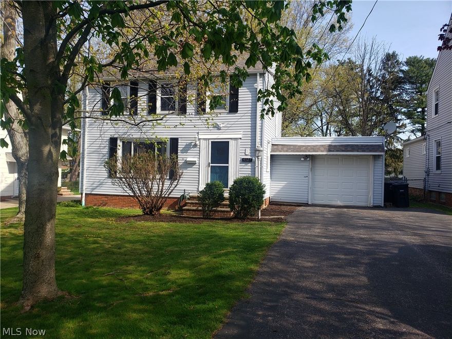 Stunning and well loved colonial on beautiful tree lined street in Lyndhurst with so many updates. This home's picturesque lot with large inviting fenced backyard and winding new stamped concrete patio is everything you need to host your next outdoor get together. Stepping inside the beautiful foyer you will find all the spaces you need to entertain, from large and elegant living room with fireplace which leads directly to dining room and kitchen with updated appliances all installed with luxury vinyl flooring. From there step down into the expansive family room with a wall of new windows overlooking the scenic backyard. Upstairs you will find 3 good sized bedrooms all remodeled with breathtaking red oak wood floors installed in 2017 and full bathroom.  From the kitchen you lead down to a second full bathroom and large pantry for all your storage needs. New gutters in 2019 and new front porch stairs in 2012.  In addition homeowner is offering a one year home warranty so there truly is