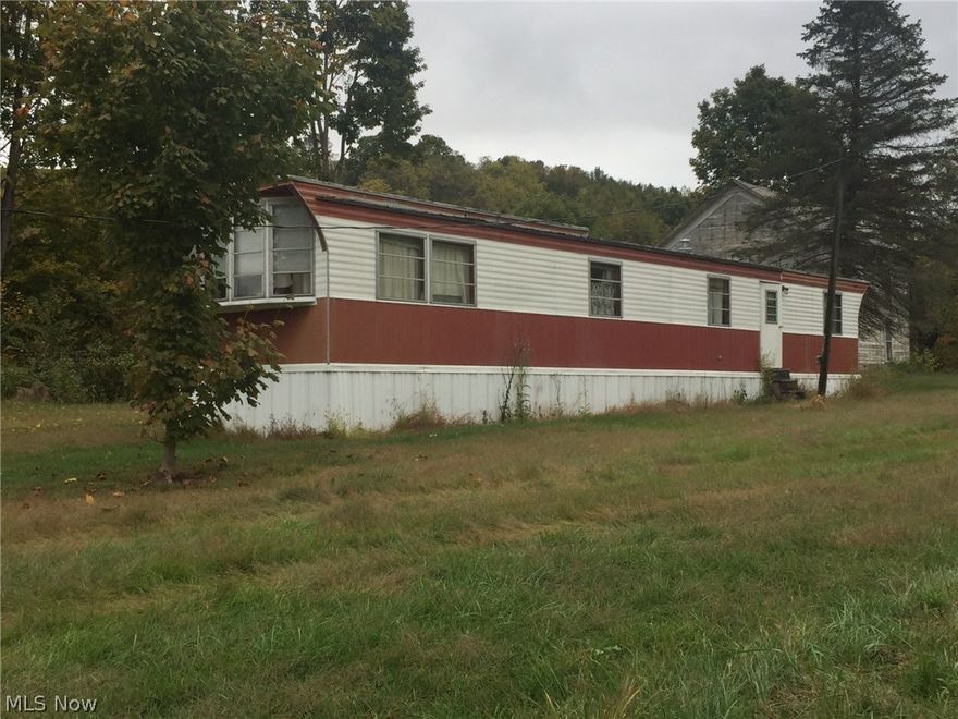 This prime tract of recreational/hunting acreage contains ideal getaway potential.  With a long ridgetop overlooking a natural funnel the property features what sportsmen look for when considering recreational ground.  With large lanes, a shooting house, pond, mobile home, and barn; the property is ready for the recreational buyer.  Property will be offered in two tracts and combination. Mineral rights have been previously withheld and portions of the property have been mined and reclaimed.   Feel free to ride/walk the property. Bring your ATV & side by side to get a true view of the ridge. Bring your bow, immediate hunting rights transfer with receipt and deposit of non-refundable downpayment.  FOR COMPS ONLY