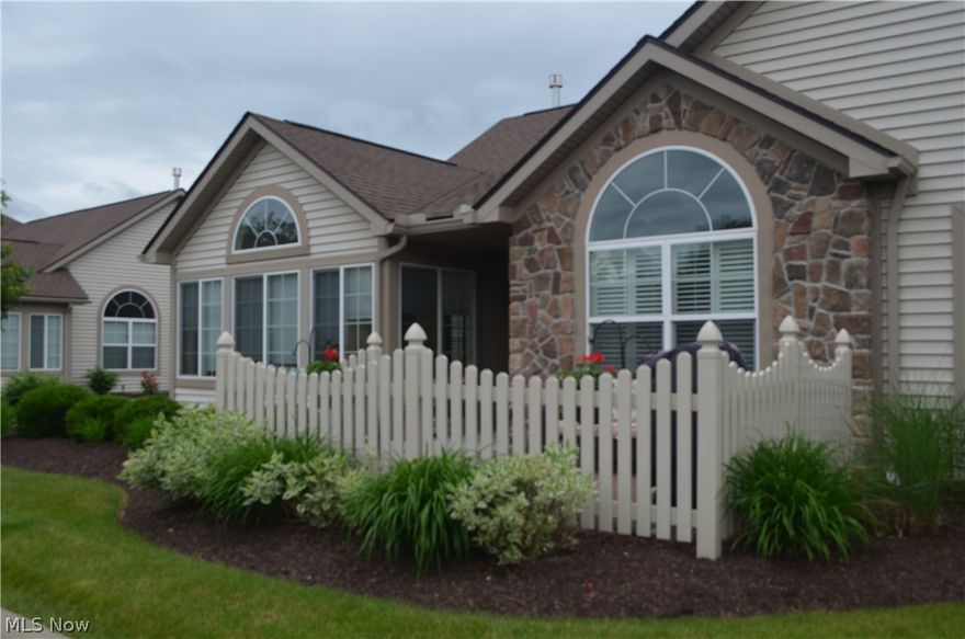 Maintenance free living in the beautiful Crossings at West Valley! Canterbury Floor Plan ranch style condo/cluster home with an open floor plan with cathedral ceilings throughout. Living room with electric start fireplace, is wired for surround sound. Spacious kitchen with tons of storage, a breakfast bar, and plenty of Corian countertop space, as well as above and under cabinet lighting. The 17x14 master bedroom is carpeted and has an upgraded bathroom with dual sinks and marble flooring, as well as a 7x6 walk-in closet. The large (14x11) second bedroom is carpeted and has a spacious closet. Plantation shutters in bedrooms, den/office, and living room. Additional rooms include a full bathroom, a quiet den/office (can be used as a third bedroom), a four season room with fingertip blinds, in-suite laundry with cabinets (a 7x6 closet and washer & dryer that stay), large walk-in closets, and a brick patio. The spacious two car garage is insulated and painted.  Call today to schedule your