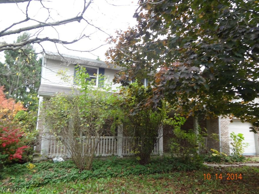 Some deferred maintenance including garage door & spouting. Landscaping could use some attention. Cosmetics needed.