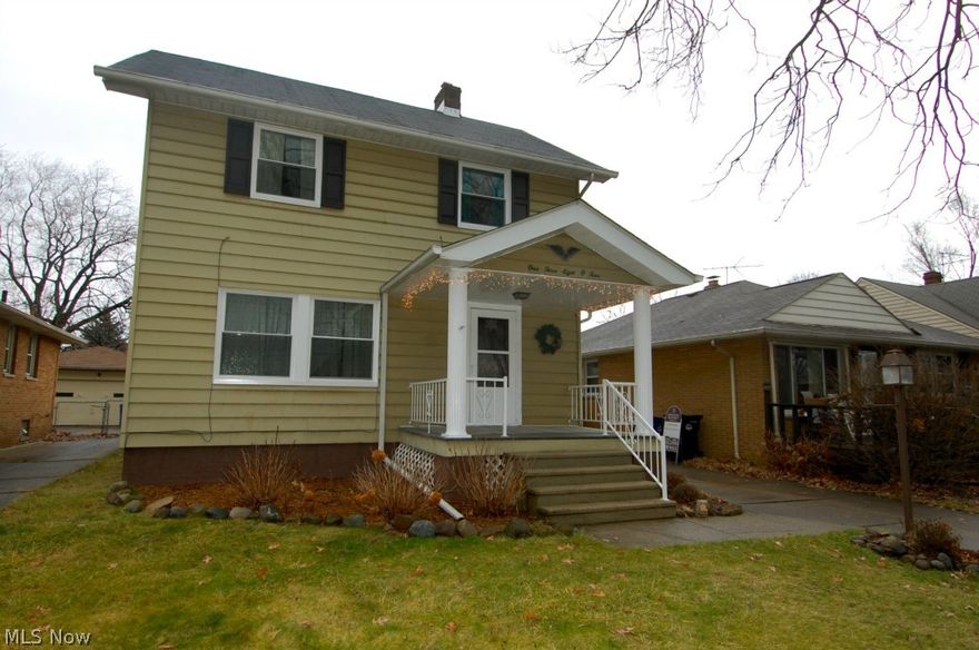 Charming and updated--just move in! The character you are looking for--hardwood flooring, natural woodwork, fireplace. Updates you want--replacement windows, newer garage, rec room, waterproofing. Nice layout with living room, formal dining room, finished walk-up third floor. Remodeled second-floor bath. Kitchen is bright and attractive with new countertop, new refrigerator. Beautiful backyard with deck, patio, pretty landscaping. Deck is accessed from new sliding doors in dining room. Front-porch curb appeal on a low-traffic street. See now!