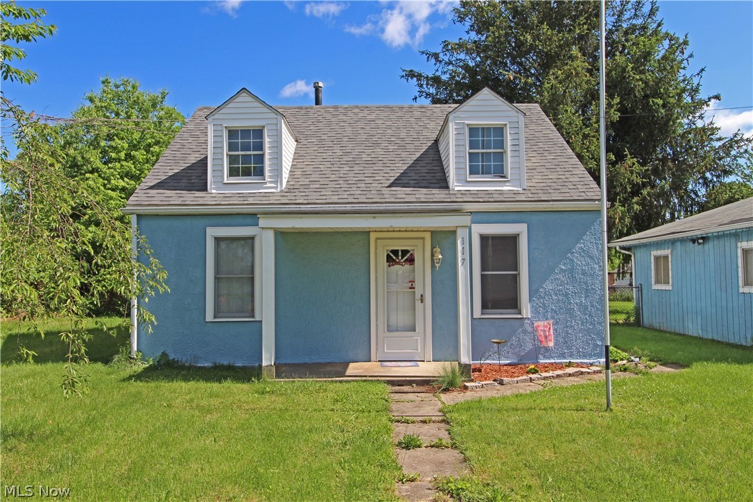 Looking for a flat, fenced-in yard? Extra garage space? Quiet neighborhood? Then look no further than this 3 bedroom cape cod on an oversized lot on Hooverson Heights! Features include first floor master bedroom and laundry room plus an upgraded kitchen with oak cabinets and laminate flooring. Don't forget about the nearly 900 sq ft detached garage with heat, electric and water access. Homes are still selling quickly, so call today before it's too late!
