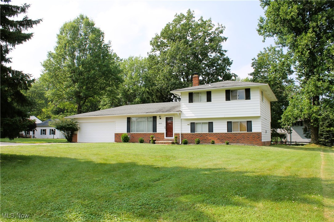 Excellent Opportunity to own this gorgeous home with over 2,000 sq. ft. of living space which is a rarity in the area! Large Three Bedroom Two Full Bath Split Level with attached two car garage. Enjoy outdoor living on the concrete patio while the kids play in the spacious (.39 acres) park-like yard with plenty of room for relaxation, gatherings and fun, this outdoor space is a true highlight featuring an above ground pool and storage shed for needed items! Nice size eat-in kitchen comes complete with appliances and adjoins the formal dining room with sliders! Lower level is excellent for entertaining, featuring an enormous recreation room (25 x 21) with wood paneling, wet bar and full bath. Located off the recreation room is a basement with laundry area, Newer (10/24) furnace and plenty of storage. The home offers a ton of natural light throughout, offering a light and airy feel. This home combines comfort, functionality, and a beautiful natural setting. Come see it for yourself and picture yourself enjoying all it has to offer! Repairs needed are: Basement needs waterproofed and the upstairs bath shower area needs replaced- sellers have quotes- and the garage ceiling needs repaired- all noted on the Residential Property Disclosure Form. Enjoy the area amenities which include shopping, restaurants, schools, YMCA, parks and much more! You’ll have easy access to all the amenities you need, while still enjoying the quiet surroundings!