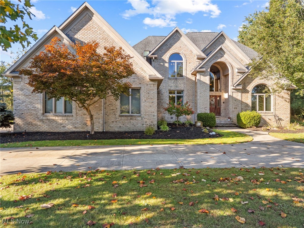 Welcome to this stunning 4-bedroom, 5.5-bath home set on nearly 2 acres in the highly sought-after Crystal Shores community, within the award-winning Revere Local School District. Meticulously maintained inside and out, this property offers an exceptional blend of elegance, comfort, and resort-style living. Step inside to find spacious, light-filled living areas and a seamless flow perfect for entertaining or relaxing. Each bedroom features its own private bath, and the home showcases high-quality finishes throughout. Outdoors, your private oasis awaits — complete with an in-ground pool and built-in hot tub, tranquil koi pond, and custom fire pit area ideal for gatherings under the stars. The beautifully landscaped grounds provide both privacy and picturesque views year-round. Grab your favorite Realtor and schedule your showing today!