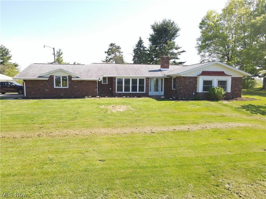 YOUR NEW TRUE RANCH HOME IN THE HILLS OF BELMONT COUNTY! Come check out this countryside home offering views, peace and privacy just minutes from town and all of your local amenities. Sitting on almost 2 acres, theres room for all of your outdoor enjoyment and entertainment on this property. In the backyard you'll find an additional 1600 sq ft building equipped with 3 large stalls, electric, water, a second story and an exhaust fan ready to be used to your liking. The detached garage offers additional storage, workshop area, or parking and is equipped with electric. Head inside the home and you will find over 4000 sq ft of newly remodeled space to call home. Laundry is located on the main living area just off the garage and kitchen offering convenience and ease. Updates include new laundry room, updated kitchen, hardwood floors throughout, new back deck, new paint, electrical and lighting throughout. The bonus room in the basement could be used as a 4th bedroom and you'll enjoy the bar and added entertainment space and storage there as well. With a modern feel and unique amenities like the four seasons sunroom, you'll love calling this one home! Call today to schedule your home tour!