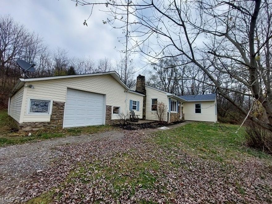 CHARMING 3 BEDROOM RANCH STYLE HOME LOCATED 2 MINUTES FROM BLOOMINGDALE EXIT OFF STATE ROUTE 22. THE HOME HAS REFINISHED HARDWOOD FLOORS THROUGHOUT AND HAS BEEN FRESHLY PAINTED AND IS A MOVE-IN CONDITION HOME. THE HOME HAS 2 FIREPLACES ONE IN THE LIVING ROOM AND ONE IN THE ENCLOSED BREEZEWAY LEADING TO THE GARAGES. THE HOME HAS A REAR DECK OFF OF BREEZE WAY. ONE CAR-ATTACHED GARAGE IS OVERSIZED AND FEELS ROOMY.2-CAR DETACHED CARPORT WITH METAL ROOF. THE FRONT PATIO HAS A BEAUTIFUL VIEW OF THE COUNTY SETTING. PRICED RIGHT WON'T LAST LONG.
