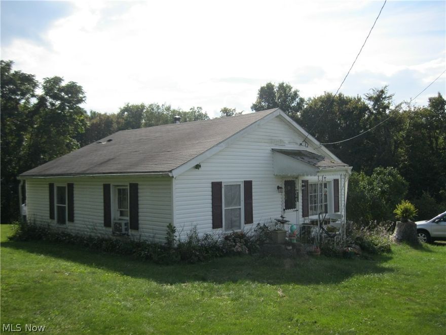 Quaint two bedrooms one bath home located on 2.69 acres. Located in West Muskingum Schools! The house looks out over Zanesville. Second parcel has a trailer on it with no water or electric to it but it can be accessed. There is no septic for the trailer. This shed is to go with the seller. This property is sold "as is".