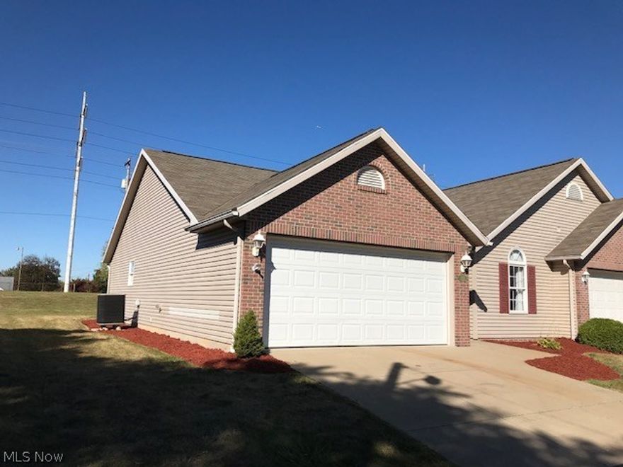 NEWER CONDO IN CONVENIENT PERRY TWP. LOCATION!  End unit with extra on street parking for your visitors.  Vaulted ceilings in master bedroom with walk-in closet.   Cook friendly kitchen with formal dining area.  Attached garage, patio and more!
