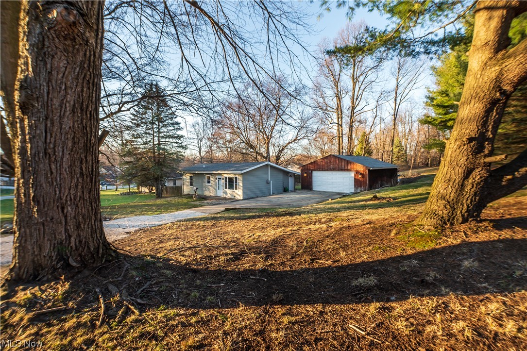 Welcome to 2399 Sadler St, situated on almost a half acre wooded lot! This home is a Two Bedroom, One Full Bathroom Ranch on a quiet road in Springfield Township. Walking in the front door, you will enter the main living room that opens up to the beautiful eat in kitchen. All stainless steel appliances included in listing will remain with the home. Plenty of updates have been done to the home over the last seven years including, Roof (house and garage) 2018, AC- 2018, Garage 220 Electric- 2018, Furnace- 2017, Hot Water tank- 2017, House Siding- 2016, Windows/Doors- 2016, Electrical- 2016, Gutters- 2016, New Well Pump/Pressure Tank- 2016, All Interior Updates- 2016. Offering a One Year Home Warranty through America's Preferred Home Warranty as well! This home has so much to offer and when you're ready for the next steps in life, this home can take you there! Schedule your private showing today!