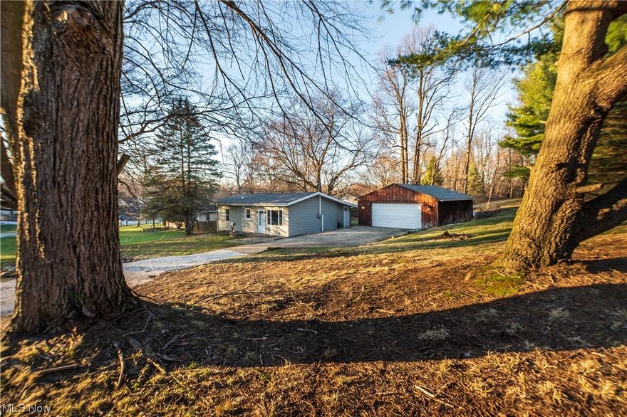 Welcome to 2399 Sadler St, situated on almost a half acre wooded lot! This home is a Two Bedroom, One Full Bathroom Ranch on a quiet road in Springfield Township. Walking in the front door, you will enter the main living room that opens up to the beautiful eat in kitchen. All stainless steel appliances included in listing will remain with the home. Plenty of updates have been done to the home over the last seven years including, Roof (house and garage) 2018, AC- 2018, Garage 220 Electric- 2018, Furnace- 2017, Hot Water tank- 2017, House Siding- 2016, Windows/Doors- 2016, Electrical- 2016, Gutters- 2016, New Well Pump/Pressure Tank- 2016, All Interior Updates- 2016. Offering a One Year Home Warranty through America's Preferred Home Warranty as well! This home has so much to offer and when you're ready for the next steps in life, this home can take you there! Schedule your private showing today!