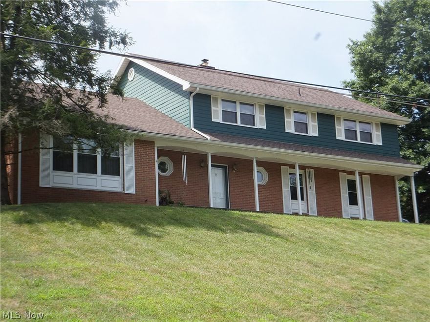 This traditional two-story home is situated on a double lot that is over .7 acres.  The exterior is brick with the upper half low maintenance concrete fiberboard siding installed in 2004.  The concrete driveway was replaced in 2008, the roof replaced with thirty year dimensional shingles in 2012.  A high efficiency Trane furnace and CA was put into service in August 2012.  The first floor family room and basement rec room received new carpeting in June 2016.  This is a great family home with a huge concrete patio area for relaxation and entertaining.